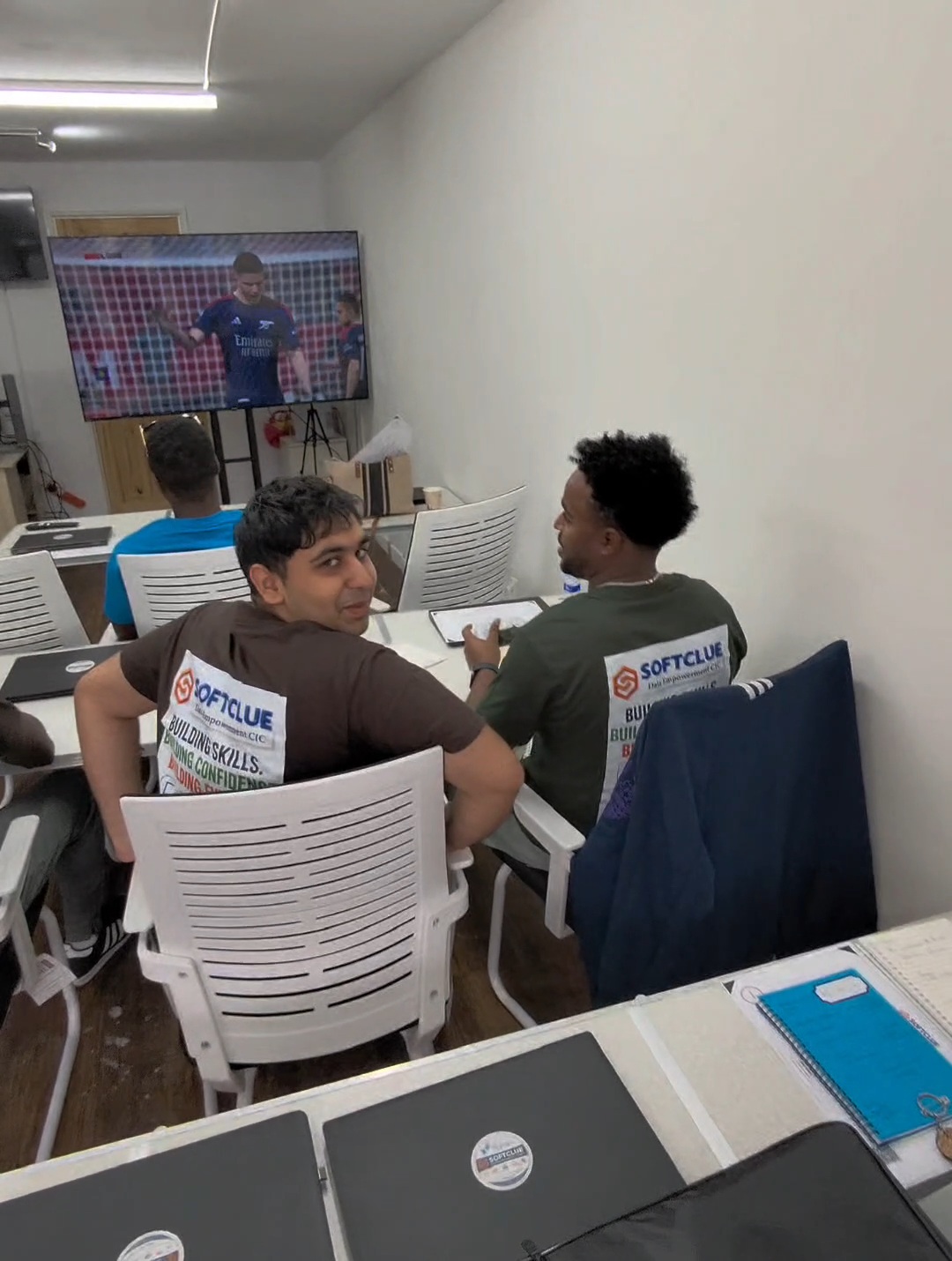 Learners working together during a live session at The POD